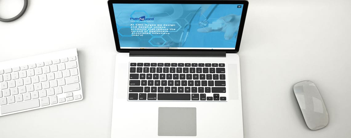 image of cmc hygea website on laptop