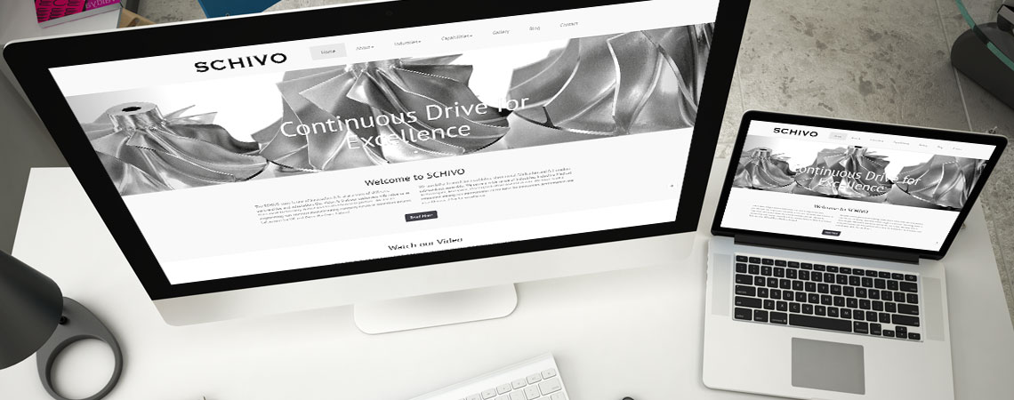 image of Schivo Group website on desktop and laptop