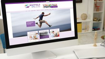 image of Whitfield Clinic website on desktop and laptop